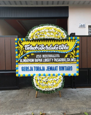 Papan Bunga Duka di Alama